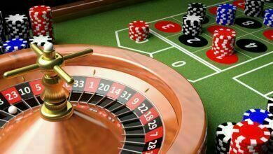 casino table with roulette and chips