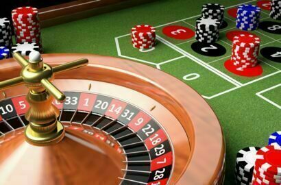 casino table with roulette and chips