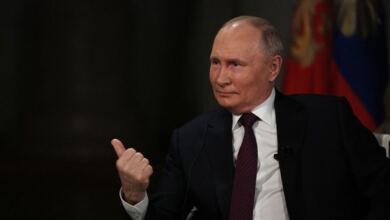 путін