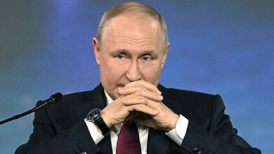 путін