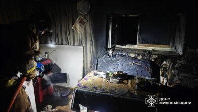 Рятувальник на місці пожежі